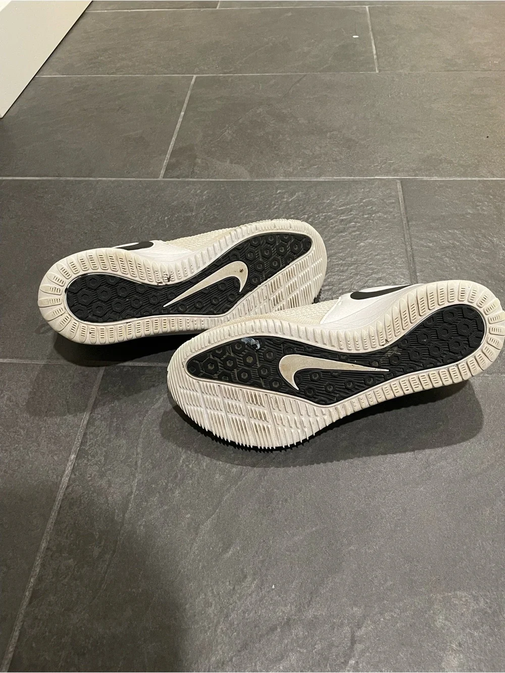 Nike White Trainers with Black Swoosh